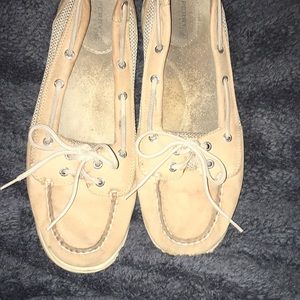 Sperry top slider shoes.